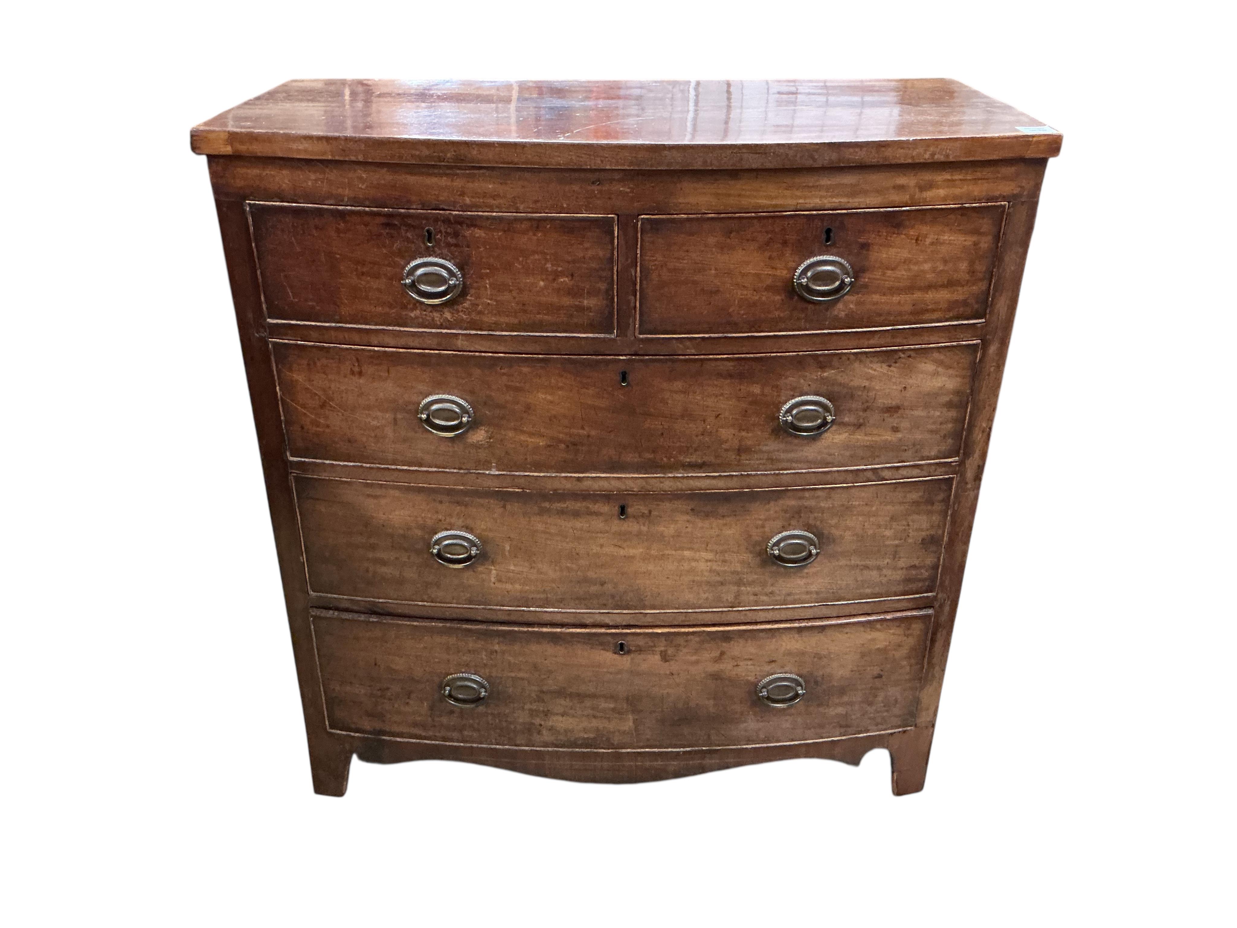 A Regency mahogany bow front chest with two short and three long drawers, width 103cm, depth 51cm, height 107cm